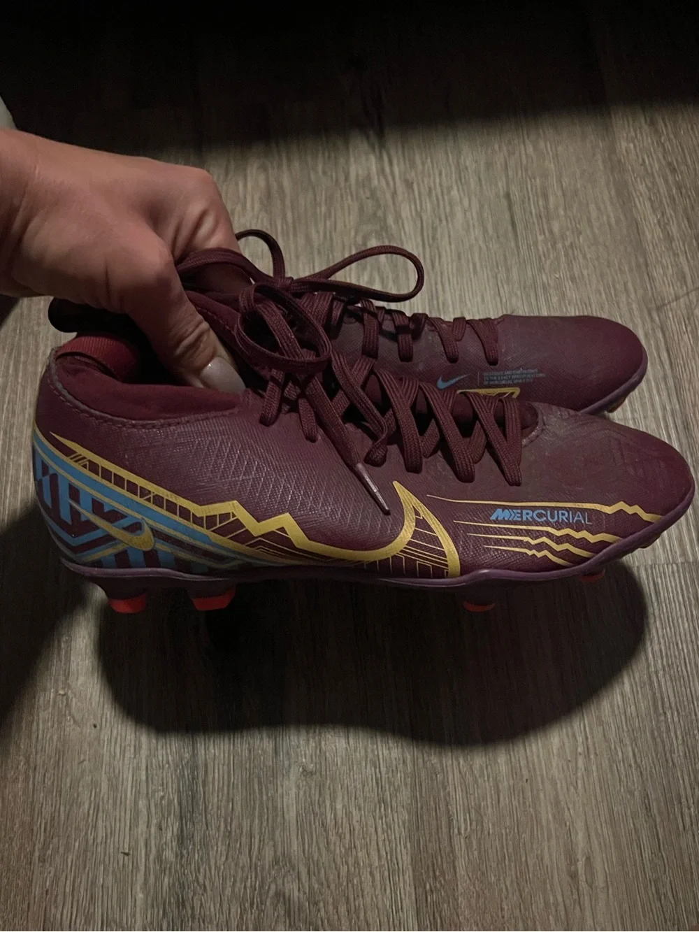 Nike Girl’s Maroon Mercurial Soccer Cleats with Gold & Blue Accents